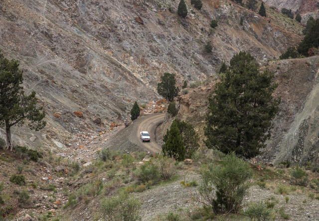 Image of IRC mobile health van driving through twisting roads